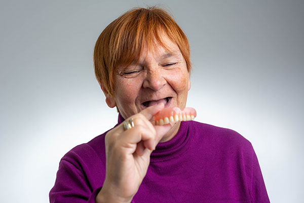 Adjusting to New Dentures: How to Deal With Loose Dentures from Allure Dentistry in Los Angeles, CA